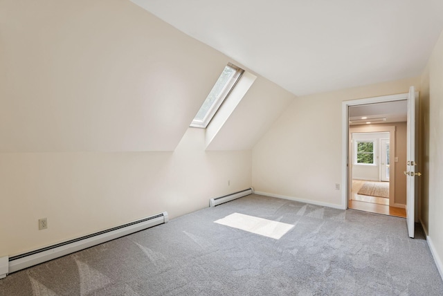 27 Libby Ln, Brunswick, ME 04011 - additional living space featuring a baseboard radiator, a skylight, carpet flooring, and lofted ceiling