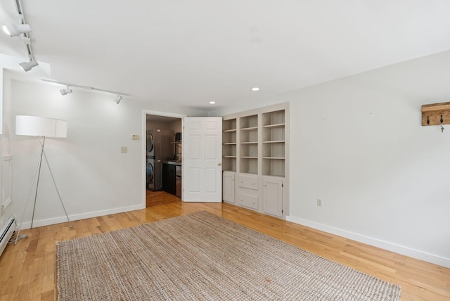 27 Libby Ln, Brunswick, ME 04011 - spare room with track lighting, light wood-style floors, stacked washer / drying machine, and recessed lighting