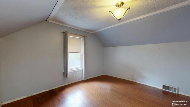 5 Wilson St, Lewiston, ME 04240 - bonus room with wood finished floors and lofted ceiling