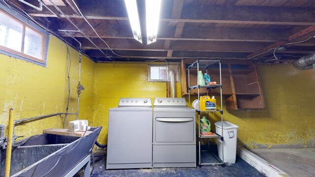 5 Wilson St, Lewiston, ME 04240 - below grade area featuring washer and clothes dryer and a sink