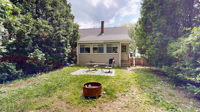 5 Wilson St, Lewiston, ME 04240 - back of property with a yard