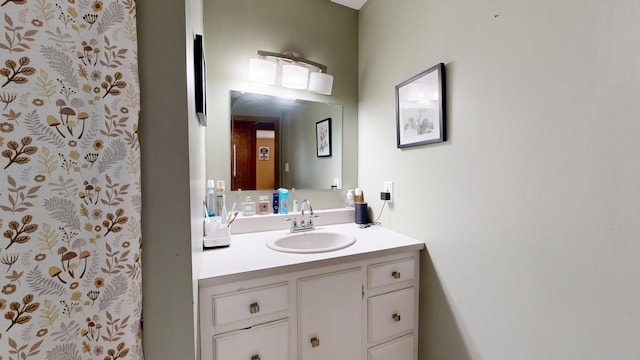 5 Wilson St, Lewiston, ME 04240 - bathroom with vanity and a shower with curtain