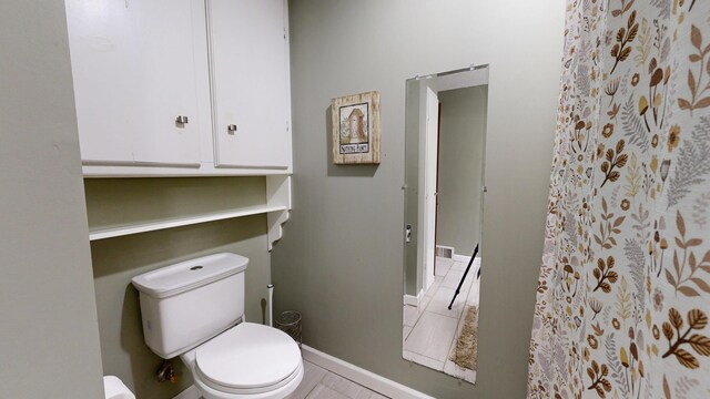 5 Wilson St, Lewiston, ME 04240 - bathroom featuring toilet and baseboards