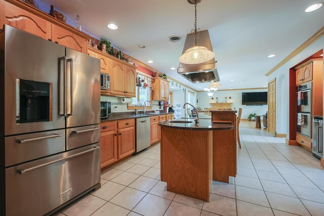6 Grande Ave, Lewiston, ME 04240 - kitchen featuring stainless steel appliances, a kitchen island with sink, light tile patterned floors, ornamental molding, and hanging light fixtures