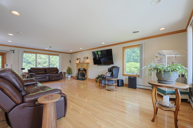 6 Grande Ave, Lewiston, ME 04240 - living area with ornamental molding, healthy amount of natural light, recessed lighting, and wood finished floors