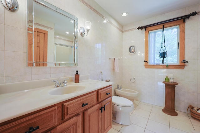 6 Grande Ave, Lewiston, ME 04240 - full bath with tile walls, a bidet, vanity, tile patterned flooring, and a shower with door