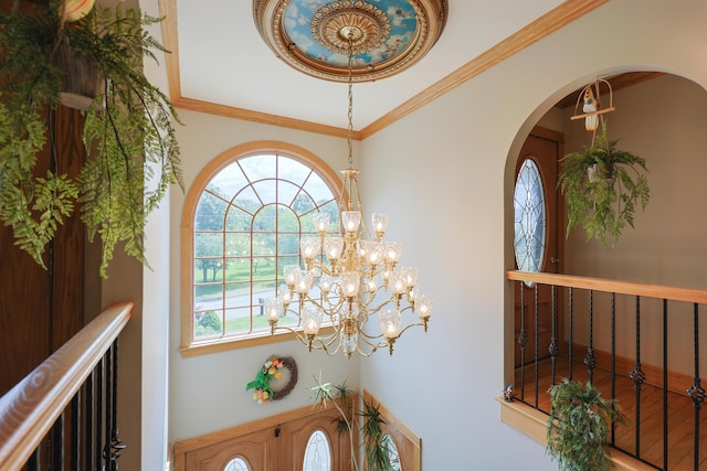 6 Grande Ave, Lewiston, ME 04240 - detailed view of a chandelier, arched walkways, and crown molding