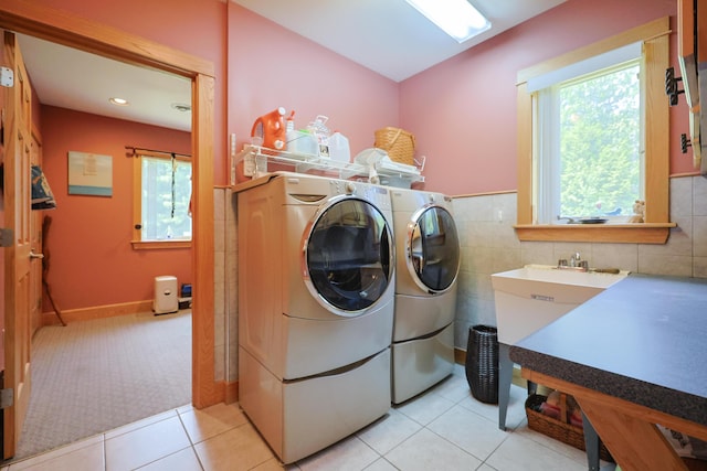 6 Grande Ave, Lewiston, ME 04240 - washroom featuring separate washer and dryer, light tile patterned floors, and light colored carpet