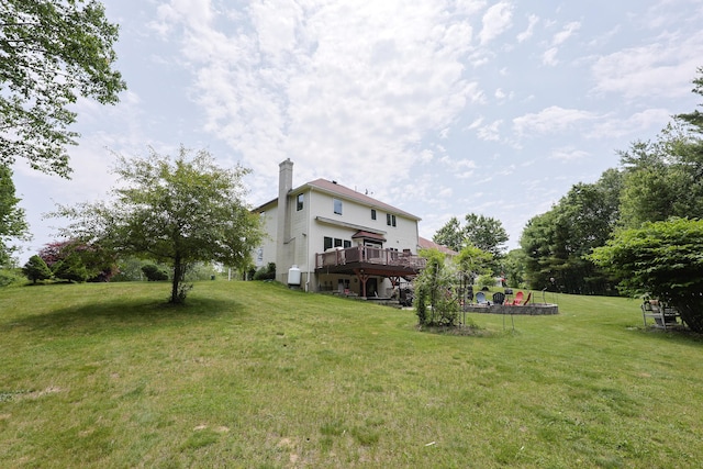 6 Grande Ave, Lewiston, ME 04240 - view of green lawn with a wooden deck