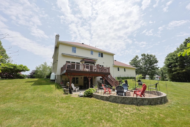 6 Grande Ave, Lewiston, ME 04240 - back of property with a fire pit, a wooden deck, a patio, stairway, and a chimney