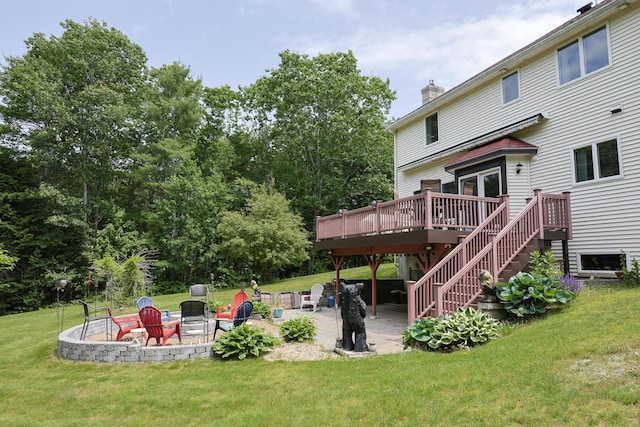 6 Grande Ave, Lewiston, ME 04240 - view of green lawn featuring a patio, a wooden deck, an outdoor fire pit, and stairway