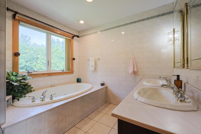 6 Grande Ave, Lewiston, ME 04240 - bathroom with double vanity, tile walls, a garden tub, and tile patterned flooring