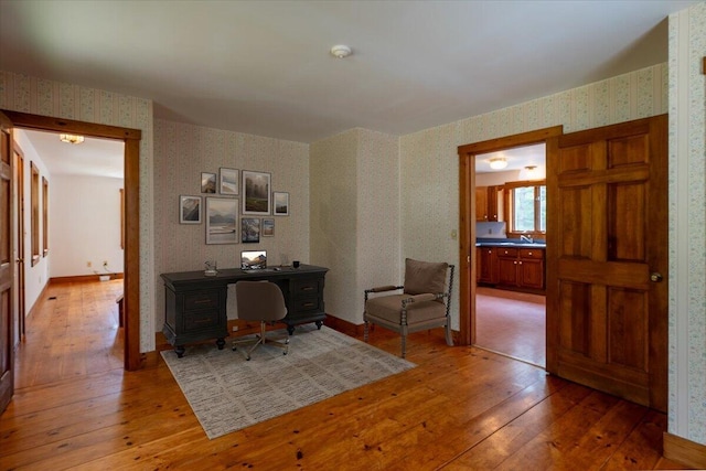 418 Buzzell Hill Rd, Hope, ME 04847 - home office featuring wallpapered walls and wood-type flooring