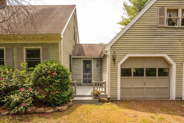 418 Buzzell Hill Rd, Hope, ME 04847 - view of front facade with roof with shingles, driveway, and an attached garage