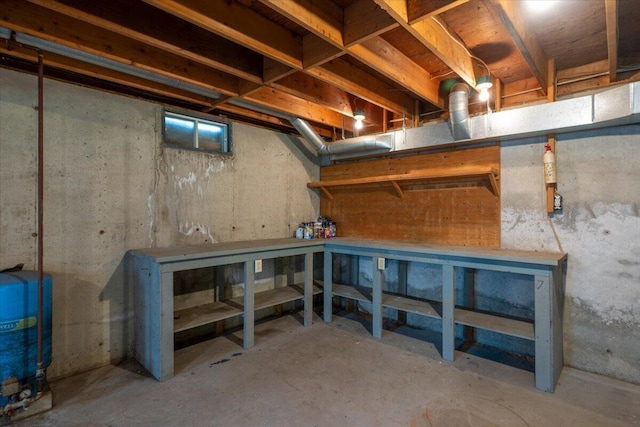 418 Buzzell Hill Rd, Hope, ME 04847 - unfinished basement with a workshop area and a water pressure tank