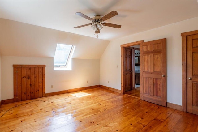 418 Buzzell Hill Rd, Hope, ME 04847 - bonus room featuring a skylight, vaulted ceiling, light wood-style flooring, and ceiling fan