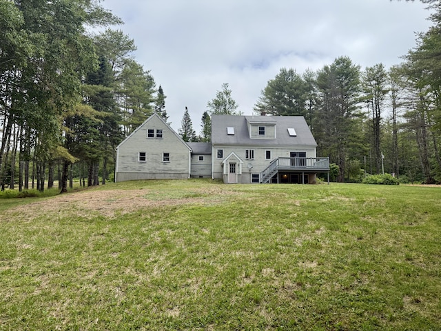 418 Buzzell Hill Rd, Hope, ME 04847 - back of property with a deck, a lawn, and stairs