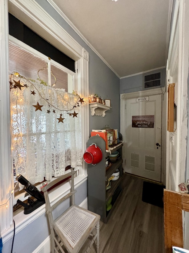164 Lancey St, Pittsfield, ME 04967 - entrance foyer featuring wood finished floors and ornamental molding