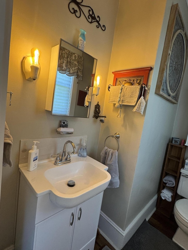 164 Lancey St, Pittsfield, ME 04967 - bathroom with toilet and vanity