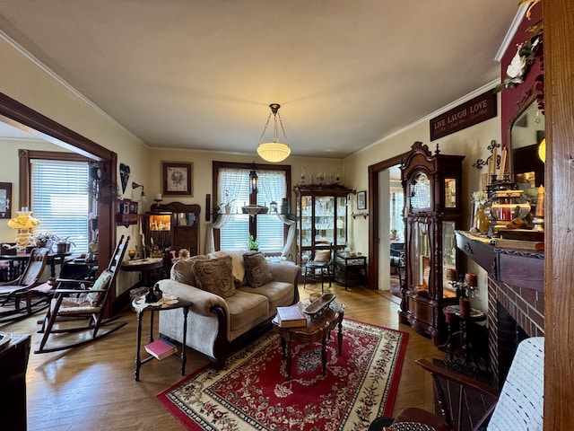 164 Lancey St, Pittsfield, ME 04967 - living area featuring plenty of natural light, crown molding, wood finished floors, and a fireplace