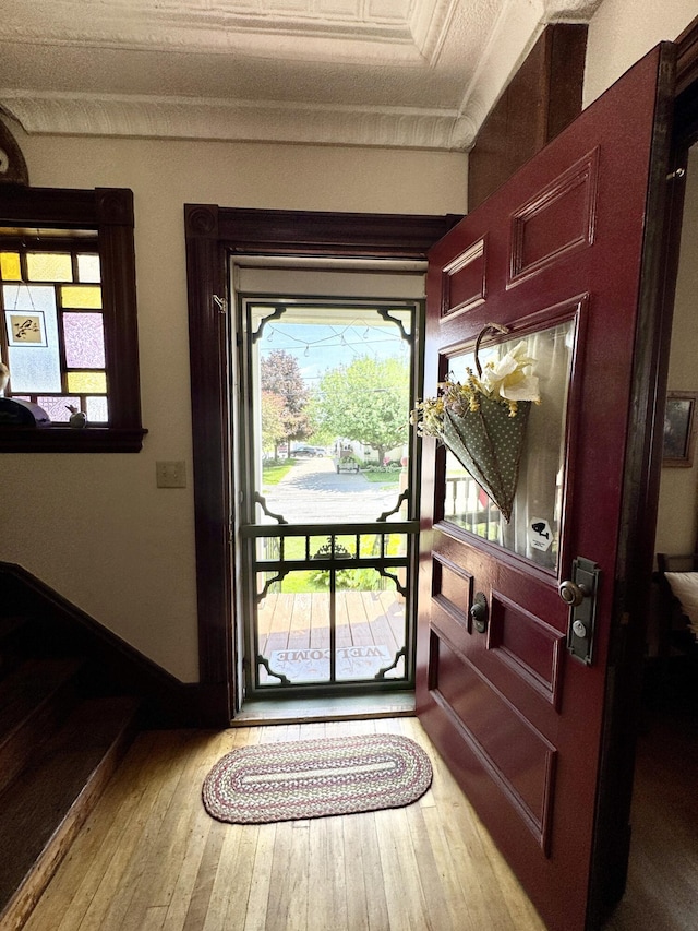 164 Lancey St, Pittsfield, ME 04967 - entryway featuring hardwood / wood-style flooring and crown molding