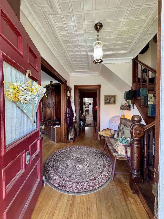 164 Lancey St, Pittsfield, ME 04967 - foyer entrance featuring an ornate ceiling, hardwood / wood-style flooring, and stairs