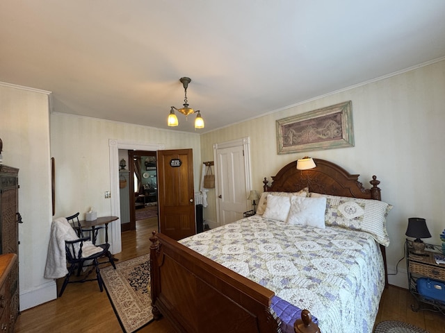 164 Lancey St, Pittsfield, ME 04967 - bedroom featuring dark wood-style floors and crown molding