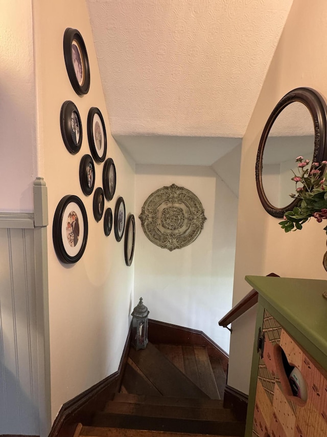 164 Lancey St, Pittsfield, ME 04967 - staircase featuring a textured ceiling and wood finished floors