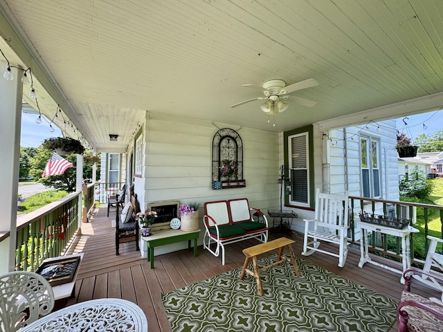 164 Lancey St, Pittsfield, ME 04967 - wooden porch with ceiling fan