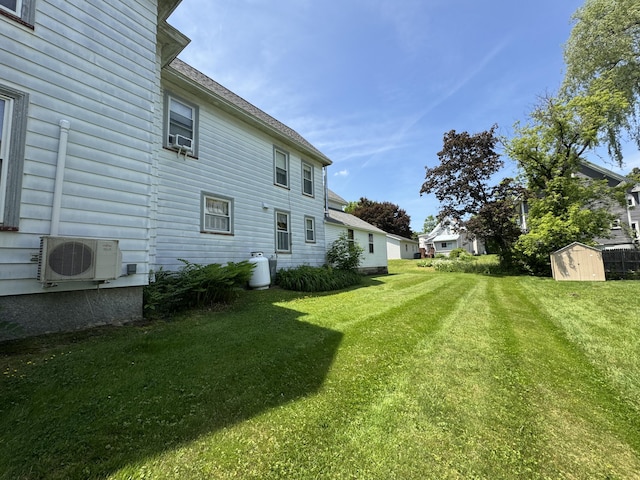 164 Lancey St, Pittsfield, ME 04967 - view of green lawn with a storage unit