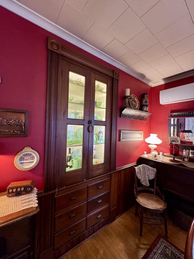 164 Lancey St, Pittsfield, ME 04967 - office featuring a wall mounted AC, wood finished floors, and crown molding