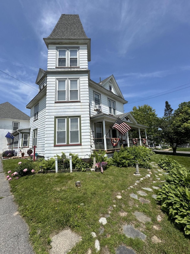 164 Lancey St, Pittsfield, ME 04967 - view of front of property with a porch and a front lawn