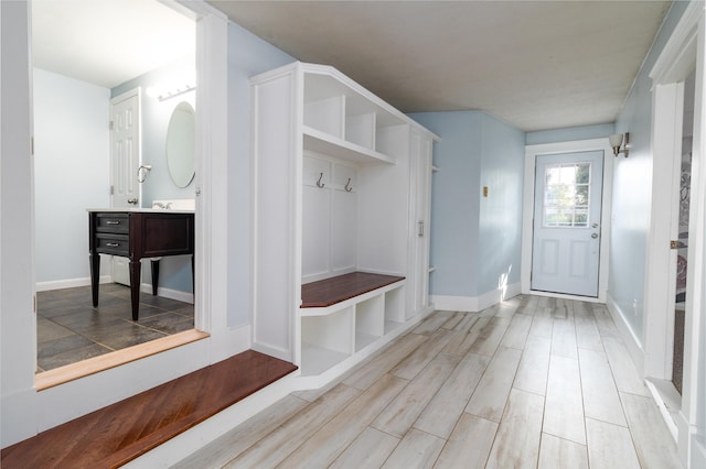 3 Dion St, Lewiston, ME 04240 - mudroom with wood finished floors and baseboards