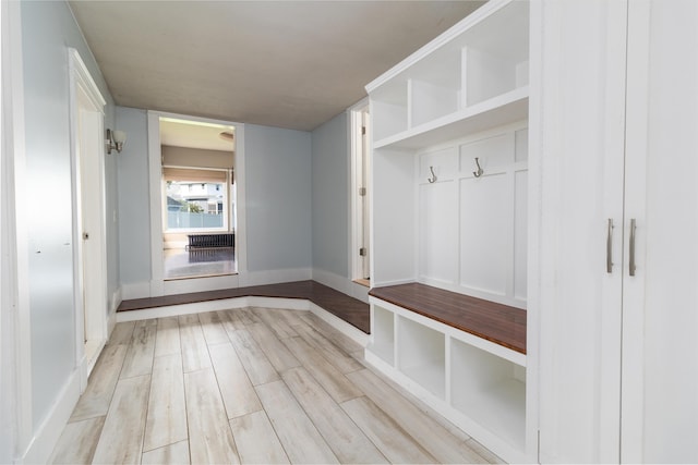 3 Dion St, Lewiston, ME 04240 - mudroom featuring wood finished floors and baseboards