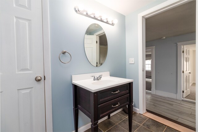 3 Dion St, Lewiston, ME 04240 - bathroom with vanity and wood finished floors