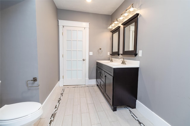 3 Dion St, Lewiston, ME 04240 - bathroom with double vanity and toilet