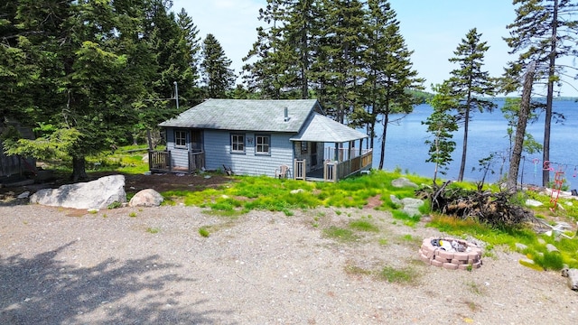 21 Jung Rd, East Machias, ME 04630 - view of front of home with a fire pit and a water view