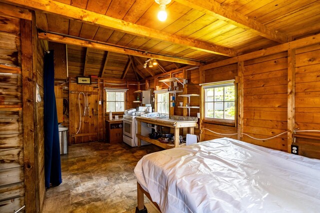 21 Jung Rd, East Machias, ME 04630 - bedroom featuring wood ceiling, dark stone finish flooring, and wood walls