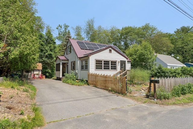 80 Merrymeeting Rd, Brunswick, ME 04011 - bungalow-style house featuring solar panels and a metal roof