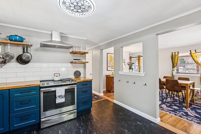 80 Merrymeeting Rd, Brunswick, ME 04011 - kitchen with butcher block countertops, stainless steel electric range, wall chimney range hood, blue cabinetry, and ornamental molding