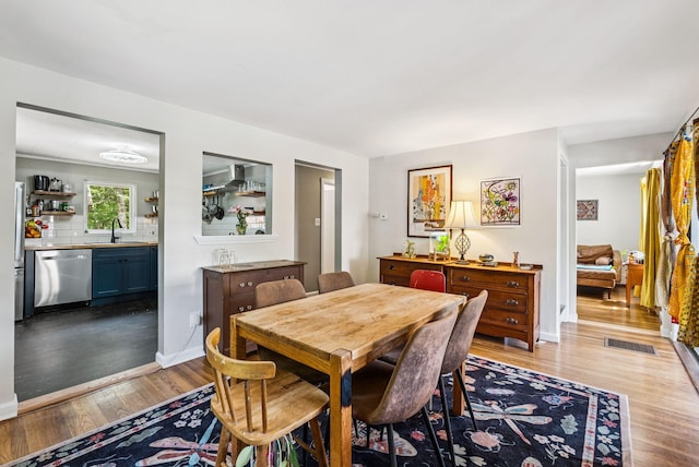 80 Merrymeeting Rd, Brunswick, ME 04011 - dining space featuring light wood-style floors and baseboards