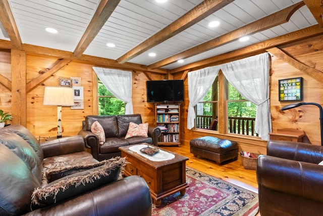 32 Lake Como Dr, Harmony, ME 04942 - living room with hardwood / wood-style floors, beamed ceiling, wooden walls, and recessed lighting