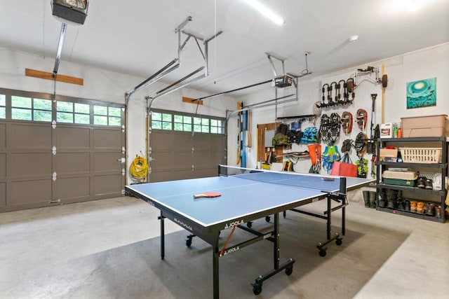 32 Lake Como Dr, Harmony, ME 04942 - playroom with concrete flooring and a garage