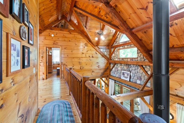 32 Lake Como Dr, Harmony, ME 04942 - corridor with wood walls, light wood-style floors, wooden ceiling, and an upstairs landing