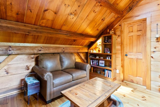 32 Lake Como Dr, Harmony, ME 04942 - living area featuring hardwood / wood-style floors, wood ceiling, and wooden walls