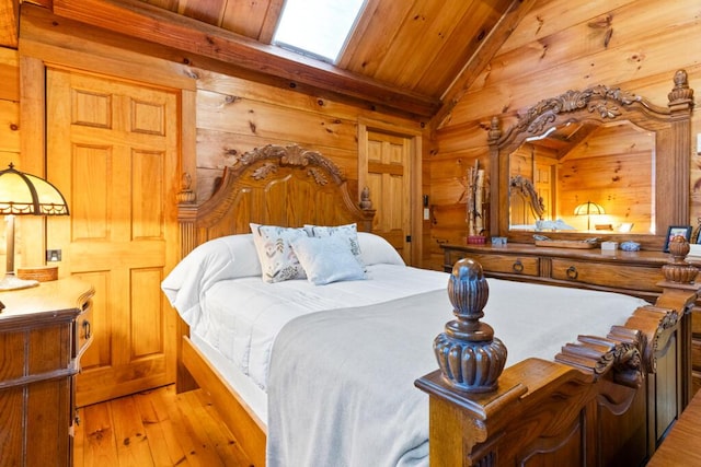 32 Lake Como Dr, Harmony, ME 04942 - bedroom with light wood-type flooring, wood walls, and wooden ceiling