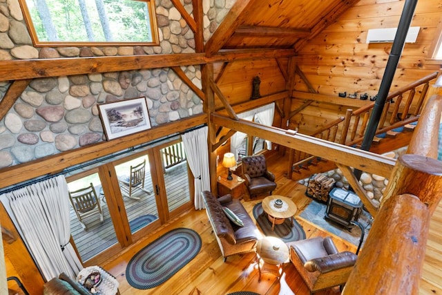 32 Lake Como Dr, Harmony, ME 04942 - living area featuring wooden walls, wood-type flooring, vaulted ceiling, and wooden ceiling