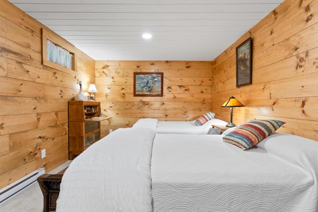 32 Lake Como Dr, Harmony, ME 04942 - carpeted bedroom featuring a baseboard heating unit, wood walls, and recessed lighting