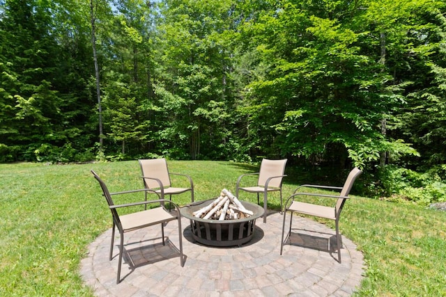 32 Lake Como Dr, Harmony, ME 04942 - view of patio / terrace with a fire pit