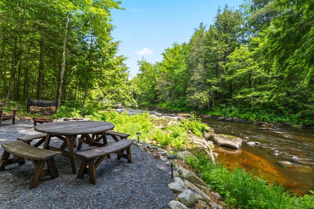 32 Lake Como Dr, Harmony, ME 04942 - view of yard featuring a wooded view